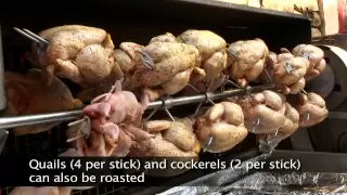 RG wood fire - Cooking spit-roasted chickens