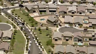 Police investigate after an officer was shot near 43rd Avenue and Baseline Road