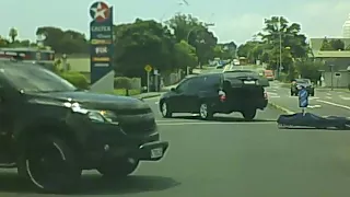 Shocking Moment Body Bag Falls From Hearse