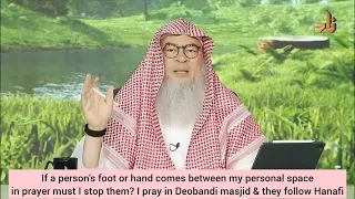 Can I pray in Deobandi masjid Passing in front of a person who is praying (Hand Foot assim al hakeem