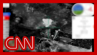 See Ukrainian drone drop bombs on Russian battle tank