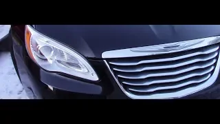 How to change head light bulb on a Chrysler 200