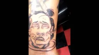 Severed Head On Plate Tattoo.wmv