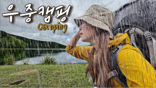 Camping in front of a lake with a view of Mount Fuji on a rainy day