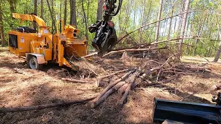 Chipping up brush piles