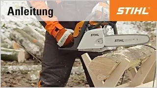 Brennholz sägen auf dem Sägebock - ansetzen mit einer STIHL Motorsäge