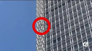 Climber scaling Renaissance Center ticketed