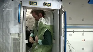 Astronaut Preparing for Sleep in ISS