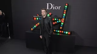 Robert Pattinson at the photocall of the Dior Menswear Fashion Show