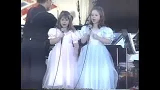 INCREDIBLE 7 AND 5 YEAR OLD SINGERS WITH ORCHESTRA SINGING "IT'S A HARD KNOCK LIFE"