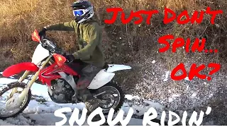 Dunlop Geomax AT81EX Tire on a Honda CRF250X in the snow around the house.