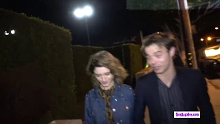 Actors Charlie Heaton and Natalia Dyer are seen leaving the crowded Maxfields party in LA.