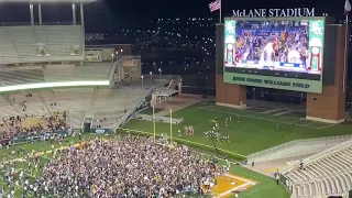 Baylor Fans swarm the Football field after Baylor wins the National Championship