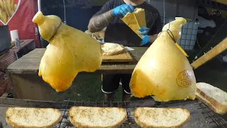 Hanged Cheese 'Caciocavallo' Melted on Bread, 'Mozzarella' on Burgers. Italy Street Food