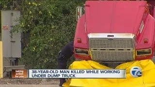 38-year-old man killed while working under dump truck