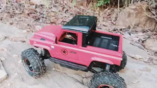 HBToys ZP1001 with WPL MN90 Bodyshell rock crawling test.