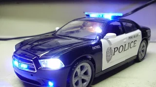 Sylvester's custom Pine Bluff Police Department Dodge Charger diecast model w/ working lights