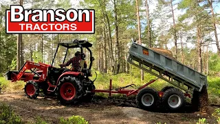 Branson TYM 2500 med Kranman tippvagn DX220T