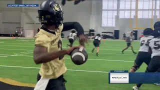 Why are the Buffs wearing social media handles on their practice jerseys?