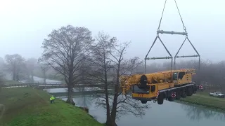 Watch TNT's Manitowoc 18000 Lifting Another Crane Across a Canal