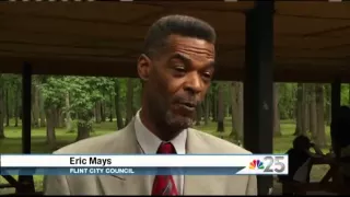 Flint councilman charged with disorderly conduct after being escorted out of a council meeting