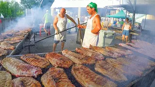 Huge Festival of Pork Ribs and Sausages. North Italy Street Food Event