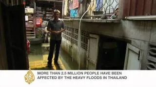 Rising floods threaten central Bangkok