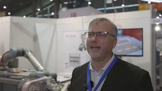 Martin Buerger from Enimac speaks to the Adhesives & Bonding Expo Europe team