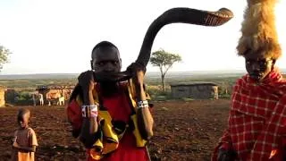 Maasai with Kudu Horn and Lion Skin hat, Kenya