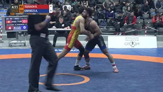 1/8 GR - 60 kg: R. TEIISHOV (KGZ) v. A. KARAKUS (TUR)