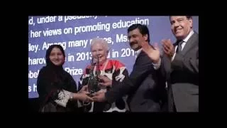 Malala's parents receiving the DFLGala2016 Luminary Award on her behalf