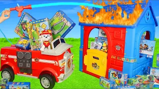 Le camion de pompier de Pups éteint une maison de jeu