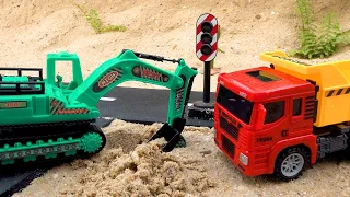 Construction vehicles at work | Excavator and dump truck install traffic lights | BIBO TOYS