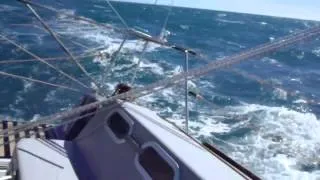 single-handed sailing in front of the Strait of Magellan, wind Force 7-8, reefed genoa and main sail