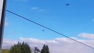 Two Apache Helicopters Flying Over My House