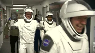 NASA’s SpaceX Crew-8: Astronauts Walk Hallway of Neil A. Armstrong Operations and Checkout Building
