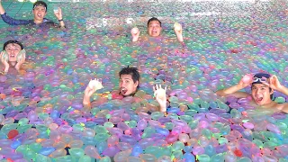 What happens when you put 55,000 water balloons in a pool!?