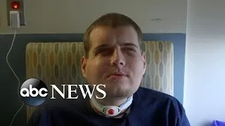 Firefighter Who Received a Face Transplant Smiles