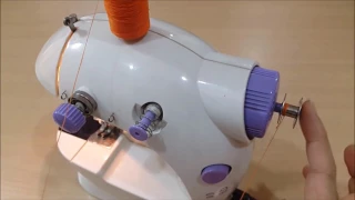 How to use and to wind a bobbin on a portable mini sewing machine with pedal video