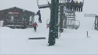 Boy dangles from ski lift after backpack gets stuck