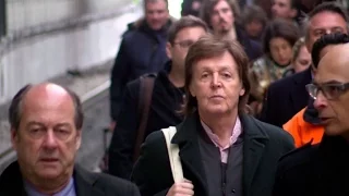 EXCLUSIVE: Paul McCartney and wife Nancy Shevell arriving at Paris gare du Nord station