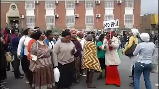 Angry crowd protests as 'flesh eating' suspects appear in court