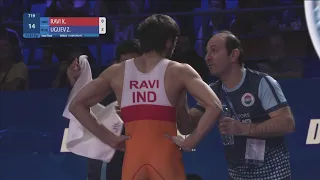 1/2 FS - 57 kg: K. RAVI (IND) v. Z. UGUEV (RUS)