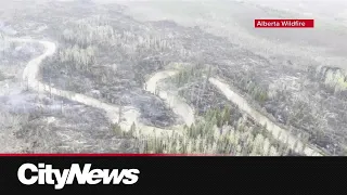 Wet weather helps crews battle wildfires in Alberta