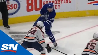 Auston Matthews Scores As Puck Squeezes Through Mikko Koskinen