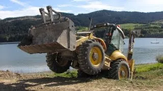 New Holland LB 115.B - extreme backhoe wheelies