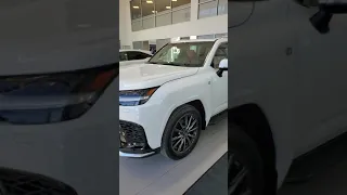 2022 Lexus LX 600 F Sport in white with the Red Leather interior