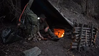 Two days solo. Survivor shelter building with fireplace inside made at stone and clay