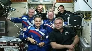 Safe docking for first Russian woman on board ISS
