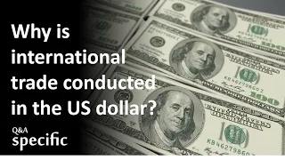 Why is international trade conducted in the US dollar?